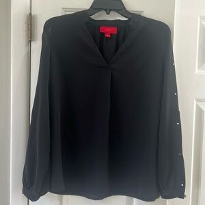 Jennifer Lopez black long sleeve blouse with sleeve cut outs, size M